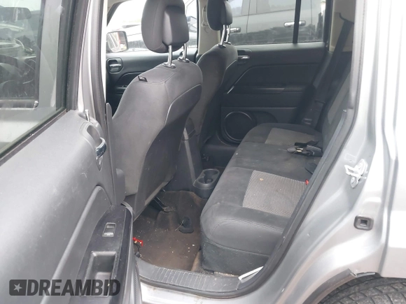 2015 Jeep Patriot Altitude Edition with VIN 1C4NJPBA8FD399095, listed as a IAAI auction lot 41236068 with 119,298 mi miles. Bid and sale history available at carsss.com. Image 8.