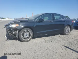 2014 Ford Fusion Titanium with VIN 3FA6P0K92ER344069, listed as a Copart auction lot 62661615 with 96,131 mi miles and Salvage title. Bid and sale history available at DreamBid. Image 1.