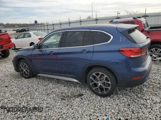 2021 BMW X1 xDrive28i z VIN WBXJG9C09M5T16797, wystawiony jako Copart lot #49322375 z przebiegiem 51 240 mil mil oraz Szkoda całkowita • Salvage title. Historia ofert i sprzedaży dostępna na DreamBid. Obrazek 2.