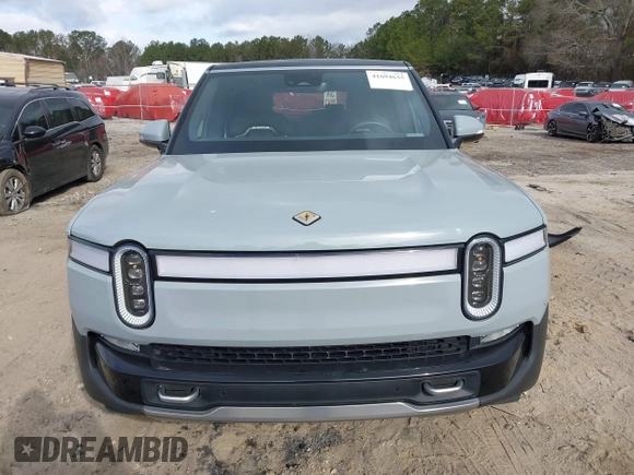 2024 Rivian R1S Adventure with VIN 7PDSGBBA1RN040036, listed as a IAAI auction lot 41694635 with 13,855 mi miles. Bid and sale history available at carsss.com. Image 13.