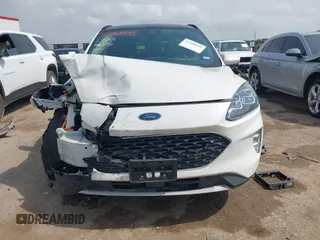 2020 Ford Escape Titanium Hybrid with VIN 1FMCU0DZ9LUA54867, listed as a IAAI auction lot 42268245 with 68,974 mi miles and . Bid and sale history available at DreamBid. Image 12.