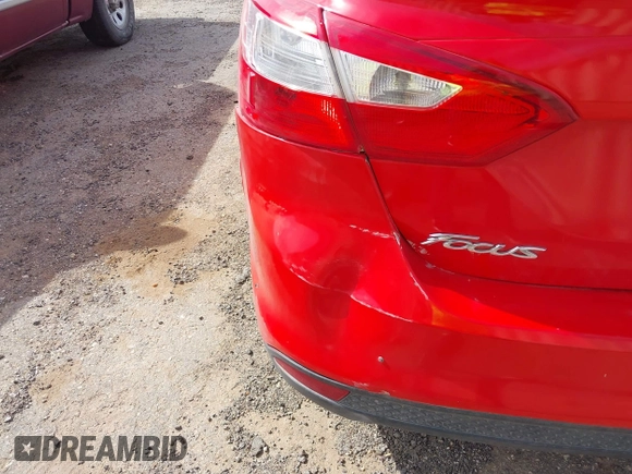 2013 Ford Focus SE with VIN 1FADP3F22DL262796, listed as a IAAI auction lot 42053634 with 72,500 mi miles and . Bid and sale history available at DreamBid. Image 12.