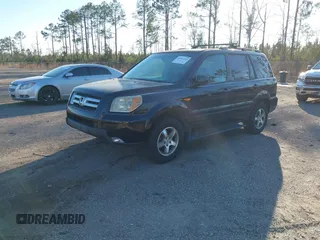 2008 Honda Pilot EX-L with VIN 5FNYF18578B010433, listed as a IAAI auction lot 41562569 with 245,451 mi miles. Bid and sale history available at carsss.com. Image 2.