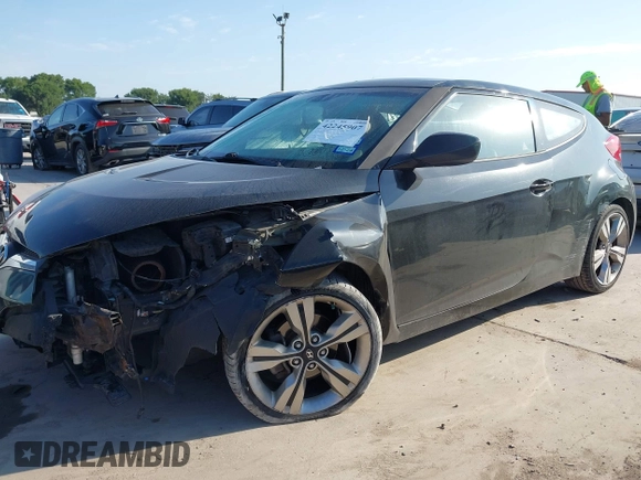 2013 Hyundai Veloster w/Black Int with VIN KMHTC6AD2DU171044, listed as a IAAI auction lot 42245907 with 140,542 mi miles and . Bid and sale history available at DreamBid. Image 2.