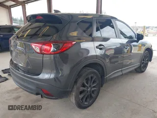 2015 Mazda CX-5 Grand Touring with VIN JM3KE2DY0F0508796, listed as a IAAI auction lot 41798482 with 110,260 mi miles. Bid and sale history available at carsss.com. Image 4.