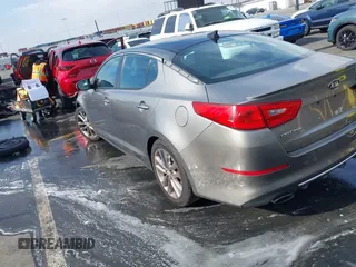 2015 Kia Optima SX Turbo with VIN 5XXGR4A69FG474261, listed as a IAAI auction lot 41103677 with 119,988 mi miles. Bid and sale history available at carsss.com. Image 3.