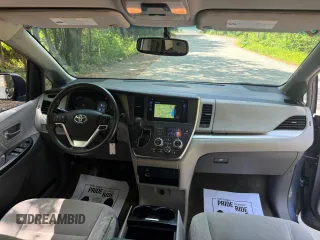 2015 Toyota Sienna LE AAS with VIN 5TDKK3DC1FS623710, listed as a Copart auction lot 62335575 with 221,148 mi miles and Clean title. Bid and sale history available at DreamBid. Image 9.