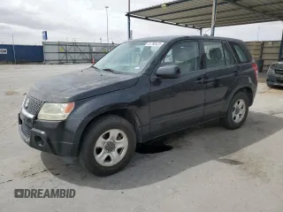 2012 Suzuki Grand Vitara z VIN JS3TE0D59C4100035, wystawiony jako Copart lot #51780435 z przebiegiem 49 620 mil mil oraz Czysty tytuł • Clean title. Historia ofert i sprzedaży dostępna na DreamBid. Obrazek 1.