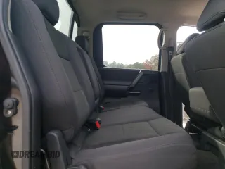 2010 Nissan Titan XE with VIN 1N6AA0EJ1AN323185, listed as a Copart auction lot 82813644 with 154,493 mi miles and Clean Title. Bid and sale history available at carsss.com. Image 10.