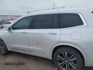 2020 Cadillac XT6 FWD Premium Luxury z VIN 1GYKPCRS2LZ101061, wystawiony jako IAAI lot #42113360 z przebiegiem Nie podano mil oraz . Historia ofert i sprzedaży dostępna na DreamBid. Obrazek 14.