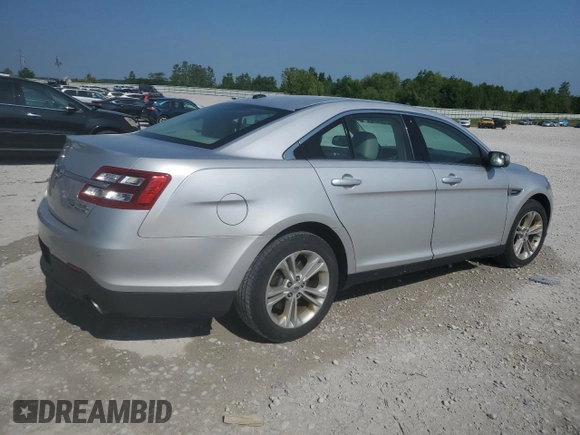 2015 Ford Taurus SEL with VIN 1FAHP2E80FG121013, listed as a Copart auction lot 59940235 with 209,632 mi miles and Clean title. Bid and sale history available at DreamBid. Image 3.
