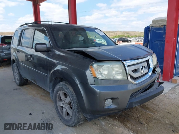 2011 Honda Pilot EX-L z VIN 5FNYF4H61BB040660, wystawiony jako IAAI lot #42106783 z przebiegiem 247 869 mil mil oraz . Historia ofert i sprzedaży dostępna na DreamBid. Obrazek 1.