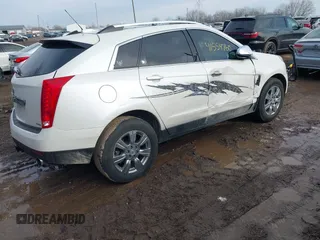 2015 Cadillac SRX Luxury Collection with VIN 3GYFNBE34FS586823, listed as a IAAI auction lot 41554760 with 176,425 mi miles and . Bid and sale history available at carsss.com. Image 4.