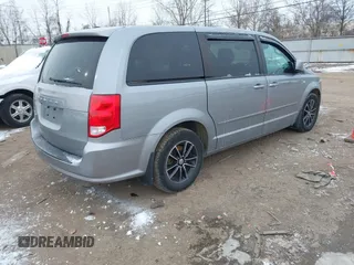 2014 Dodge Grand Caravan SXT with VIN 2C4RDGCGXER308657, listed as a IAAI auction lot 41602422 with 200,643 mi miles and . Bid and sale history available at DreamBid. Image 4.
