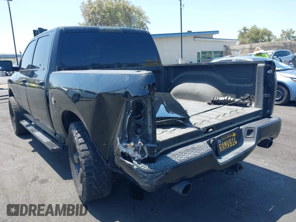 2014 Ram 1500 Express with VIN 3C6RR6KT7EG221631, listed as a IAAI auction lot 42397832 with 98,715 mi miles and . Bid and sale history available at DreamBid. Image 3.