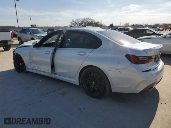 2022 BMW 3 Series 330i with VIN 3MW5R1J06N8C23668, listed as a Copart auction lot 47164585 with 0 mi miles and Salvage Title. Bid and sale history available at carsss.com. Image 2.