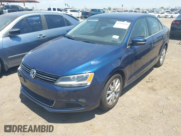 2014 Volkswagen Jetta SE z VIN 3VWD17AJ1EM303577, wystawiony jako IAAI lot #42436160 z przebiegiem 113 086 mil mil oraz . Historia ofert i sprzedaży dostępna na DreamBid. Obrazek 6.