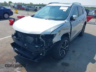 2017 Nissan Rogue SV with VIN 5N1AT2MV0HC832876, listed as a IAAI auction lot 42389131 with 73,856 mi miles and . Bid and sale history available at DreamBid. Image 6.