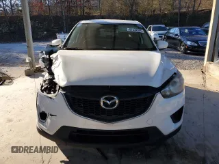 2014 Mazda CX-5 Sport with VIN JM3KE2BEXE0332590, listed as a Copart auction lot 87534365 with Not Provided miles and Salvage Title. Bid and sale history available at carsss.com. Image 5.