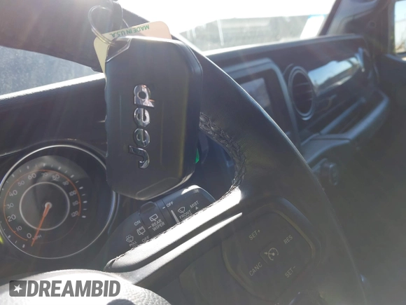 2023 Jeep Wrangler Sport S with VIN 1C4HJXDN6PW617814, listed as a IAAI auction lot 41810646 with 25,095 mi miles and . Bid and sale history available at DreamBid. Image 11.