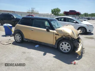 2004 MINI Hardtop z VIN WMWRC33454TC50742, wystawiony jako Copart lot #56655565 z przebiegiem Nie podano mil oraz Szkoda całkowita • Salvage title. Historia ofert i sprzedaży dostępna na DreamBid. Obrazek 4.