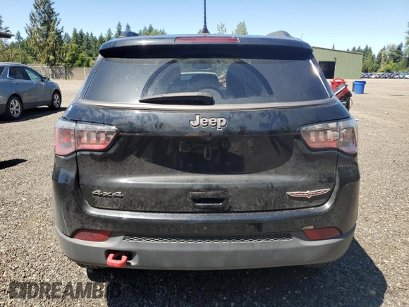 2017 Jeep Compass Trailhawk with VIN 3C4NJDDBXHT668053, listed as a Copart auction lot 63032155 with 94,090 mi miles and Salvage title. Bid and sale history available at DreamBid. Image 6.
