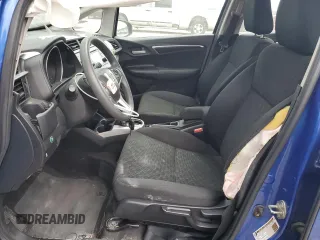 2017 Honda Fit LX with VIN 3HGGK5H55HM703996, listed as a Copart auction lot 61653735 with 77,028 mi miles and Salvage title. Bid and sale history available at DreamBid. Image 7.