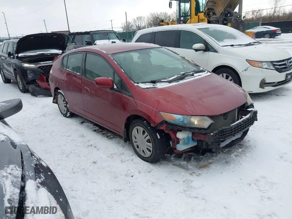 2010 Honda Insight LX with VIN JHMZE2H51AS004907, listed as a IAAI auction lot 41259182 with 76,494 mi miles. Bid and sale history available at carsss.com. Image 1.