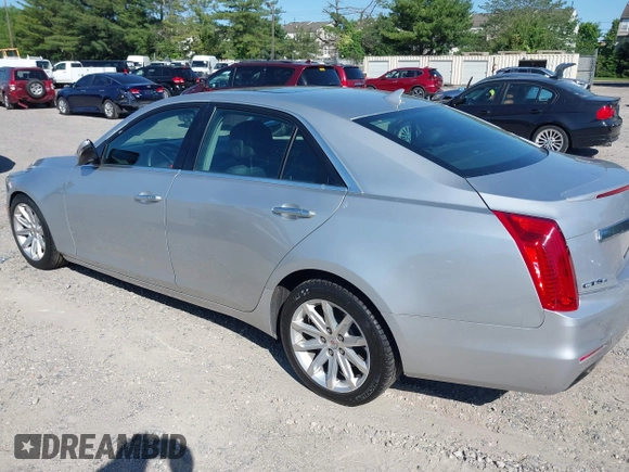 2014 Cadillac CTS Luxury AWD with VIN 1G6AX5S34E0124464, listed as a IAAI auction lot 42298607 with 89,351 mi miles and . Bid and sale history available at DreamBid. Image 3.