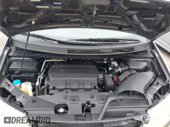 2012 Honda Odyssey Touring with VIN 5FNRL5H96CB138548, listed as a IAAI auction lot 41471856 with 186,284 mi miles and . Bid and sale history available at DreamBid. Image 10.