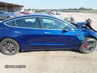 2018 Tesla Model 3 Long Range Battery with VIN 5YJ3E1EA6JF027065, listed as a IAAI auction lot 40532631 with 55,316 mi miles. Bid and sale history available at carsss.com. Image 14.