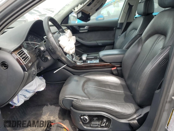 2012 Audi A8 with VIN WAURVAFD8CN018131, listed as a Copart auction lot 54260395 with 98,706 mi miles and Salvage title. Bid and sale history available at DreamBid. Image 7.