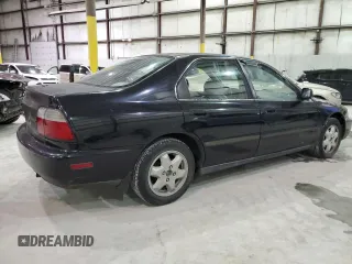 1996 Honda Accord LX with VIN 1HGCD5635TA222954, listed as a Copart auction lot 82606194 with 212,299 mi miles and Salvage Title. Bid and sale history available at DreamBid. Image 3.