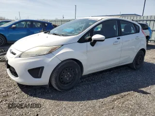 2012 Ford Fiesta SE z VIN 3FADP4EJ9CM108419, wystawiony jako Copart lot #54914235 z przebiegiem 79 887 mil mil oraz Czysty tytuł • Clean title. Historia ofert i sprzedaży dostępna na DreamBid. Obrazek 1.
