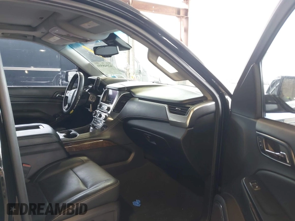 2015 Chevrolet Tahoe LT with VIN 1GNSKBKCXFR604401, listed as a IAAI auction lot 42048559 with 60,768 mi miles and . Bid and sale history available at DreamBid. Image 5.