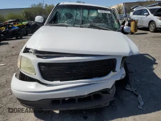 2002 Ford F-150 XL with VIN 1FTRF07L62KD27855, listed as a Copart auction lot 60939935 with Not provided miles and Salvage title. Bid and sale history available at DreamBid. Image 5.