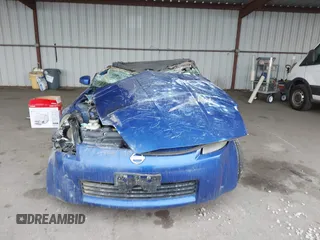 2005 Nissan 350Z Touring with VIN JN1AZ36A45M753058, listed as a IAAI auction lot 41563023 with 1 mi miles. Bid and sale history available at carsss.com. Image 12.