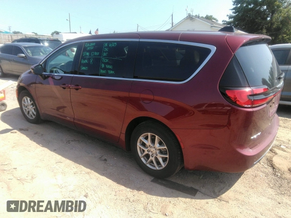 2023 Chrysler Pacifica Touring L with VIN 2C4RC1BG5PR505661, listed as a IAAI auction lot 42675532 with 8,525 mi miles and . Bid and sale history available at DreamBid. Image 3.