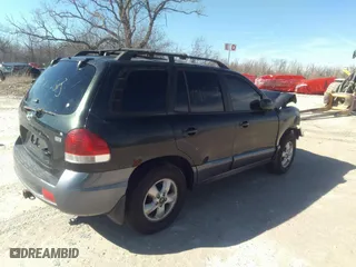 2006 Hyundai Santa Fe GLS with VIN KM8SC13E56U096895, listed as a IAAI auction lot 39109668 with 154,330 mi miles. Bid and sale history available at carsss.com. Image 4.