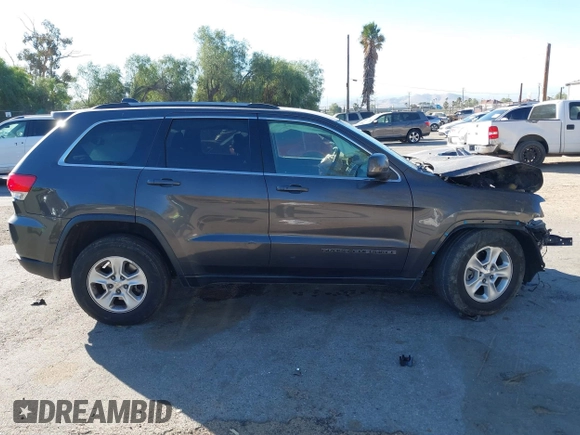 2017 Jeep Grand Cherokee Laredo with VIN 1C4RJEAG8HC944037, listed as a IAAI auction lot 41299619 with 140,405 mi miles. Bid and sale history available at carsss.com. Image 13.