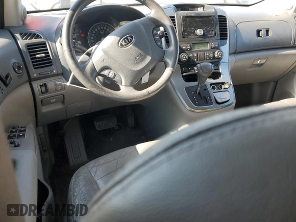 2008 Kia Sedona LX with VIN KNDMB233586210180, listed as a Copart auction lot 52090305 with 220,428 mi miles and Salvage Title. Bid and sale history available at carsss.com. Image 8.