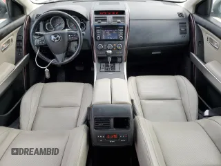 2014 Mazda CX-9 Grand Touring z VIN JM3TB2DAXE0431434, wystawiony jako Copart lot #48337475 z przebiegiem 137 803 mil mil oraz Szkoda całkowita • Salvage title. Historia ofert i sprzedaży dostępna na DreamBid. Obrazek 8.