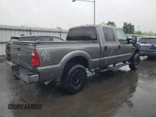 2014 Ford F-250 XL with VIN 1FT7W2B60EEA33908, listed as a Copart auction lot 54752765 with 215,428 mi miles and Salvage title. Bid and sale history available at DreamBid. Image 3.