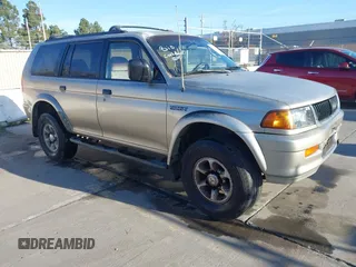 1999 Mitsubishi Montero Sport XLS with VIN JA4LS31H3XP034040, listed as a IAAI auction lot 41533558 with 265,800 mi miles. Bid and sale history available at carsss.com. Image 1.