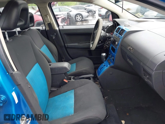 2009 Dodge Caliber SXT z VIN 1B3HB48A39D163685, wystawiony jako IAAI lot #42193202 z przebiegiem 97 479 mil mil oraz . Historia ofert i sprzedaży dostępna na DreamBid. Obrazek 5.