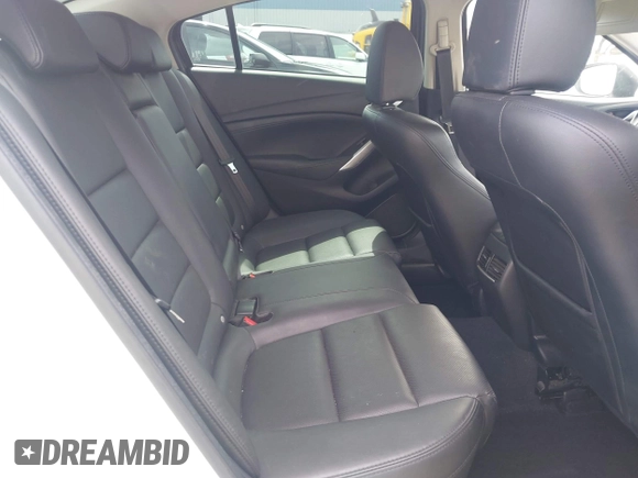 2016 Mazda Mazda6 i Touring with VIN JM1GJ1V57G1429887, listed as a IAAI auction lot 42029170 with 140,519 mi miles. Bid and sale history available at carsss.com. Image 8.