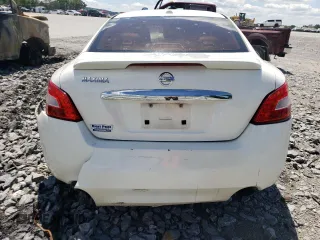 2010 Nissan Maxima SV z VIN 1N4AA5AP8AC810847, wystawiony jako Copart lot #58132315 z przebiegiem 125 500 mil mil oraz Szkoda całkowita • Salvage title. Historia ofert i sprzedaży dostępna na DreamBid. Obrazek 6.