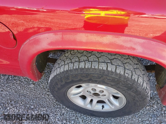 2003 Dodge Dakota Sport with VIN 1D7HL38N73S299948, listed as a IAAI auction lot 41392261 with 271,377 mi miles. Bid and sale history available at carsss.com. Image 6.