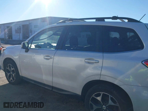 2014 Subaru Forester XT Touring with VIN JF2SJGPC9EH417920, listed as a IAAI auction lot 41270689 with 184,976 mi miles and . Bid and sale history available at DreamBid. Image 14.