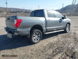 2017 Nissan Titan SV with VIN 1N6AA1E51HN537452, listed as a IAAI auction lot 41790728 with 82,521 mi miles. Bid and sale history available at carsss.com. Image 4.